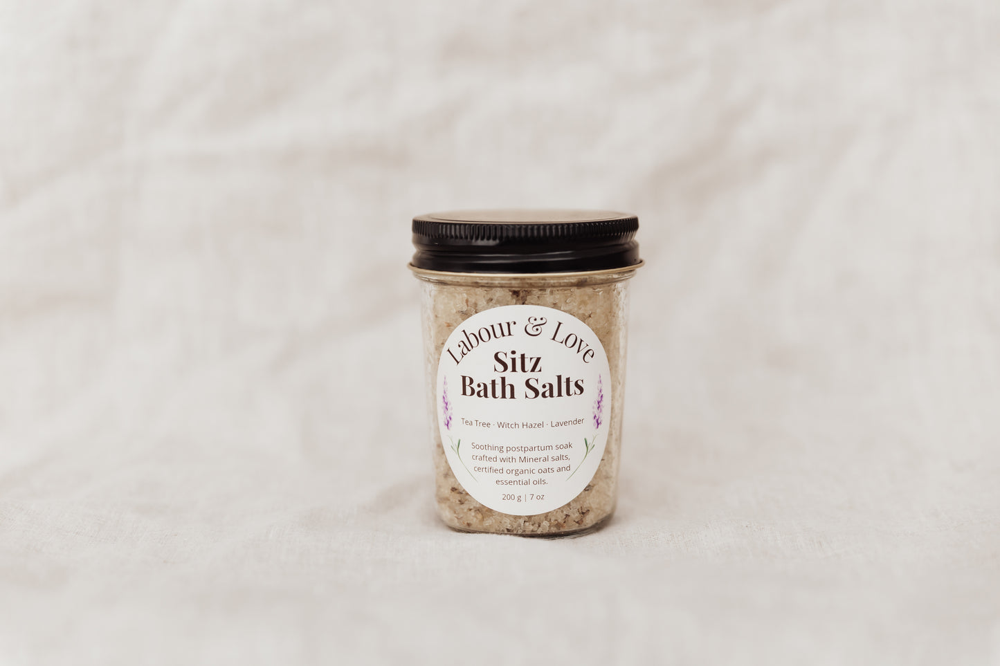 Jar of Lavender 'Labour & Love Sitz Bath Salts' on a light background