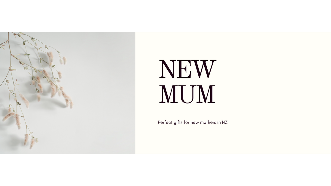 Soft editorial flat lay of wrapped new mum gift box items, kraft paper, sage ribbon and dried botanicals on linen