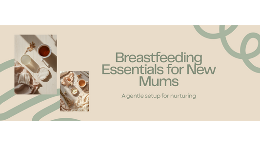 Soft editorial flat lay of breastfeeding essentials — a small pot of balm, dried oats, a ceramic teacup, and folded linen on pale timber in morning light