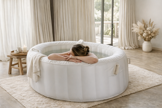 Warm water labour using a home birth pool in New Zealand, styled with neutral linen tones for a calm and natural birth environment
