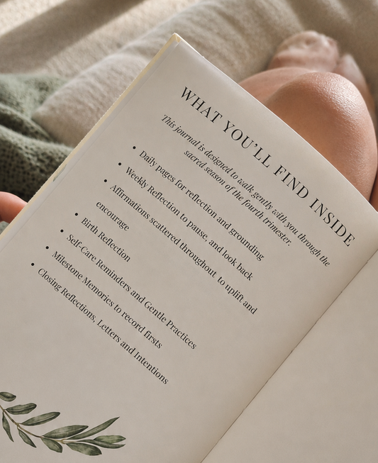 Open page of the Labour and Love postpartum journal with guided postnatal prompts for new mothers
