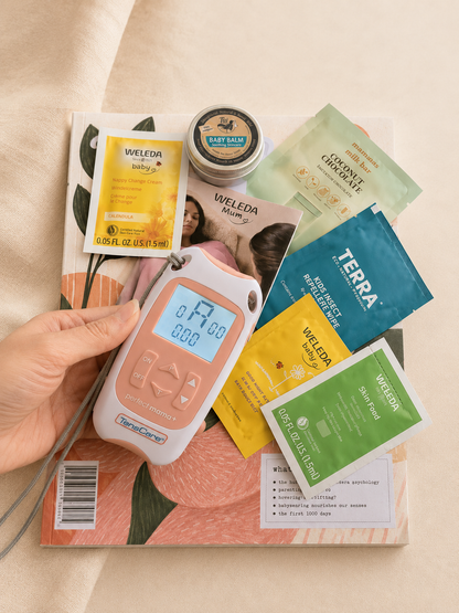 TensCare Perfect mama+ labour TENS machine held with The Nest sample pack behind — TENS hire NZ from Labour and Love