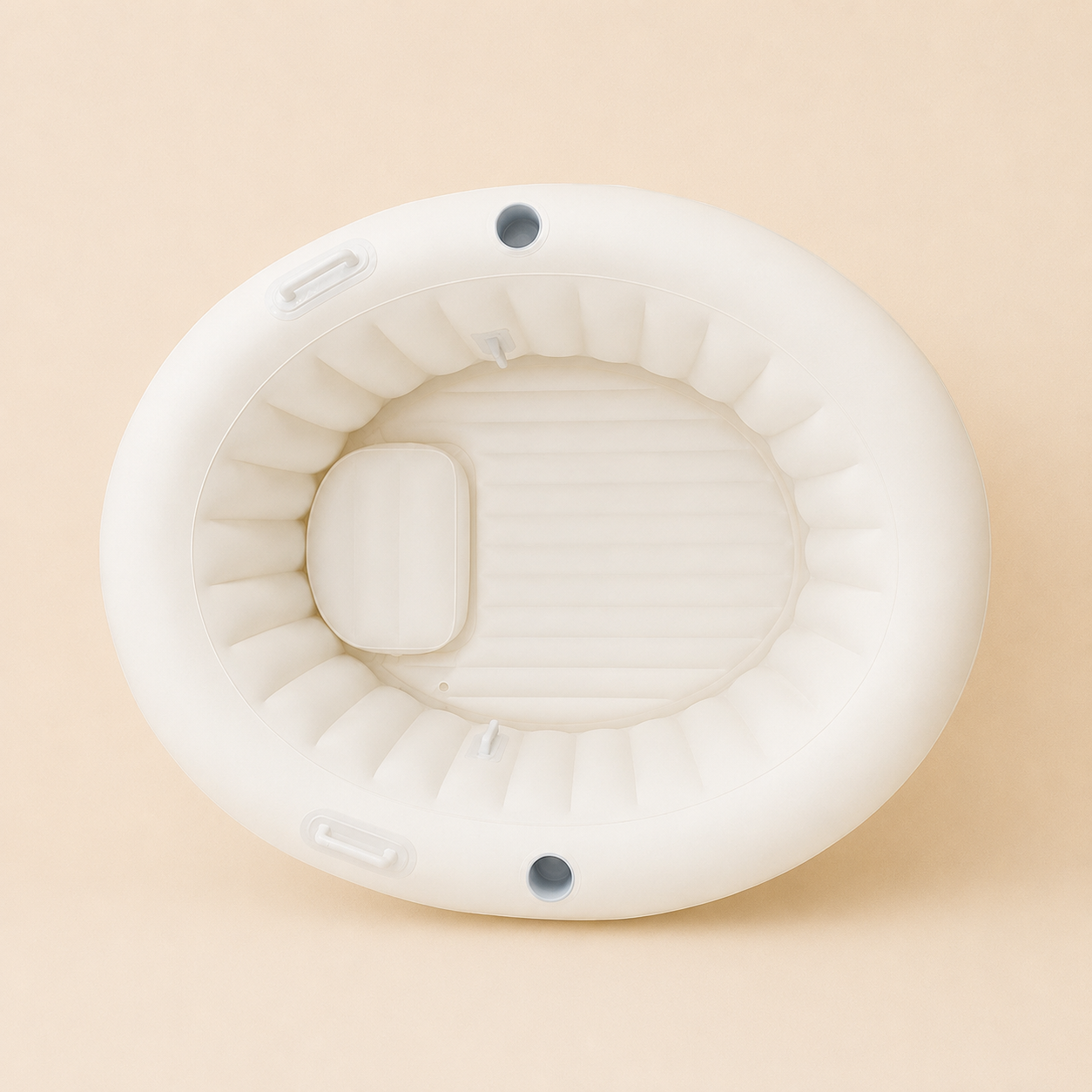 Overhead view of the Labour & Love Natural Cream birth pool showing the spacious interior, padded headrest and grab handles